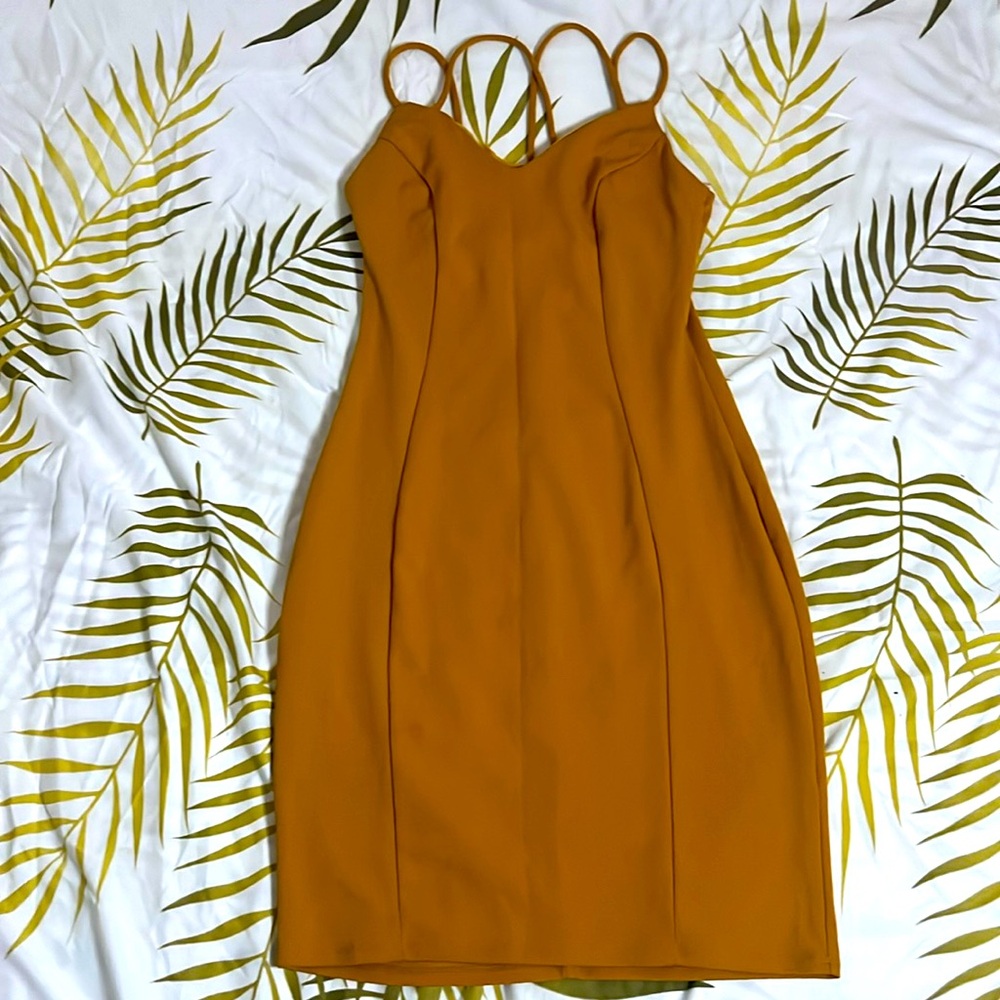 Strapped  mustard color dress. Only worn once